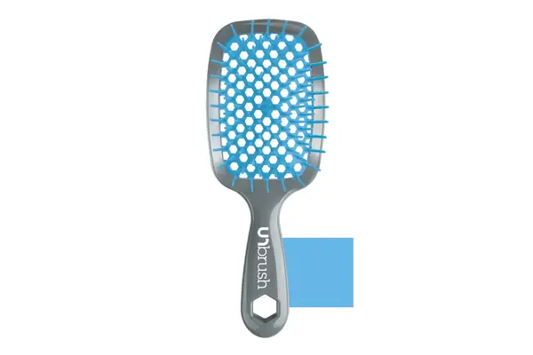 A person uses the Wet Brush Original Detangler Hair Brush