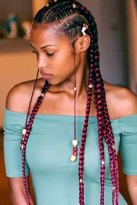 Kersti Pitre wearing red and black hair in braids