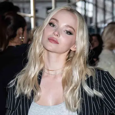 Dove Cameron with a luminous ashy blonde hair color 