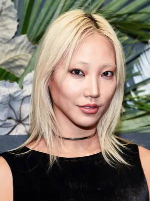 Soo Joo Park with bleached blonde hair and brows 