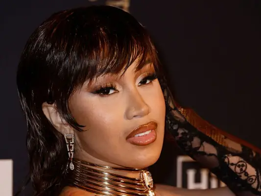 Close up of Cardi B with micro bangs and a chic mullet