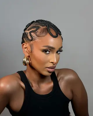 A braided hairstyle. 