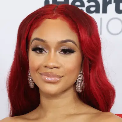 Rita Ora with a platinum blonde updo 