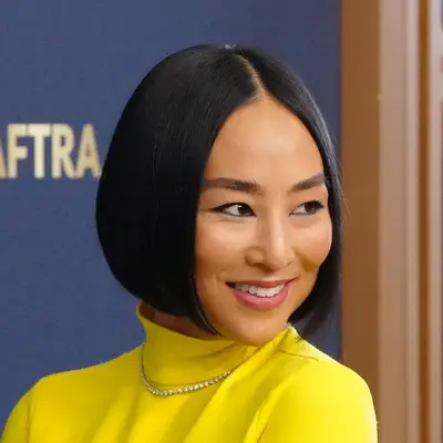 Actor Greta Lee with a bob haircut on the red carpet