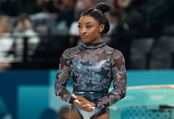Simone Biles competing in Paris. 