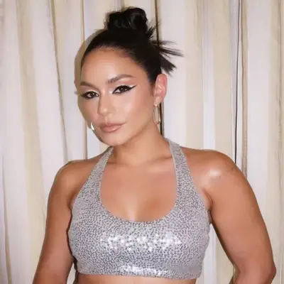 vanessa hudgens wearing a spiky bun