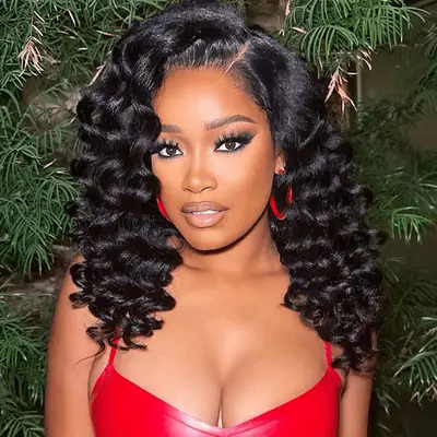 keke palmer with tight wand curls