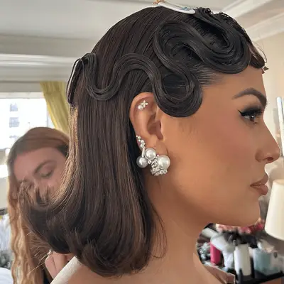 ashley graham with flippy bob and finger waves