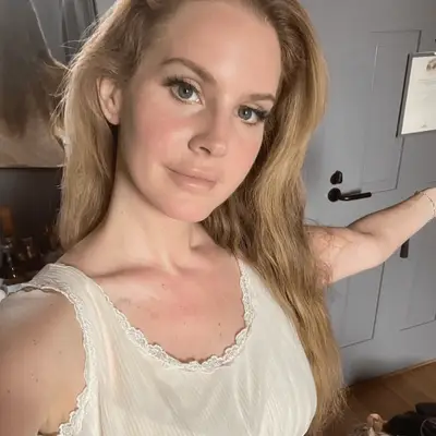 Lana Del Rey with honey blonde hair