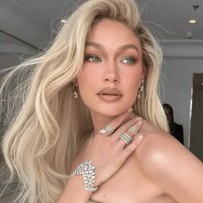Gigi Hadid with honey blonde hair in bombshell blowout