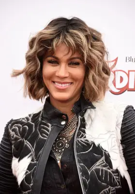 Nicole Ari Parker curly bob with bangs