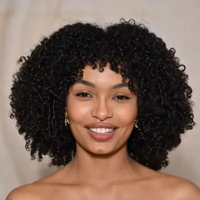 Closeup of Yara Shahidi with voluminous curly afro