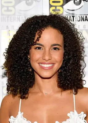 Parisa Fitz-Henley naturally curly shoulder-length hair