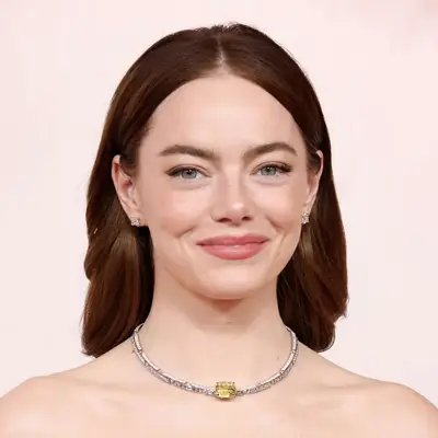 emma stone round face hair cut middle part