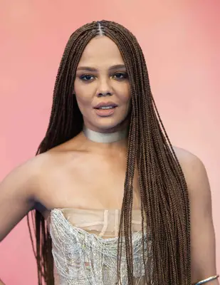 Tessa Thompson with long, center parted box braids