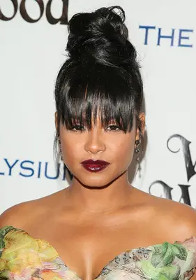 Christina Milian with a high bun and clip-in bangs at the 2016 HEAVEN Gala in Culver City, California