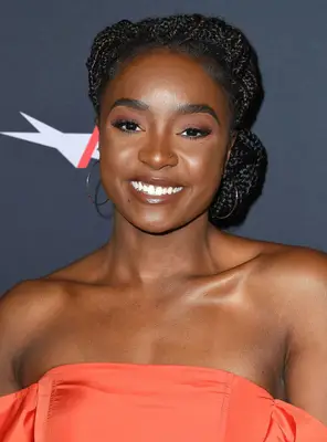 Kiki Layne with a low and twisted braided bun at the 2019 AFI Awards in Los Angeles, California