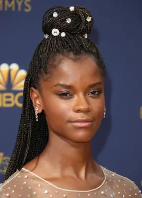 Letitia Wright with a braided half-up, half-down look with rhinestone accessories at the 2018 Emmy Awards in Los Angeles, California