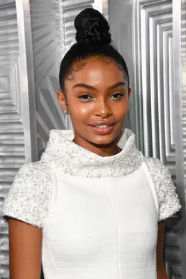 Yara Shahidi with a high bun and laid edges at Elle