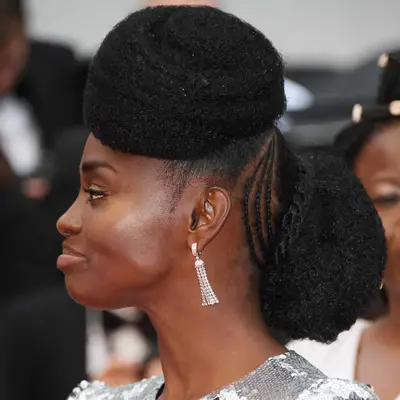 Aissa Maiga with two braided buns at the 2018 Cannes Film Festival