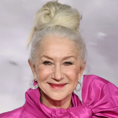 Helem Mirren with a high blonde bun at the 