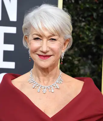 Helen Mirren with a short gray elegant pixie cut at the 2020 Golden Globe Awards in Beverly Hills, California