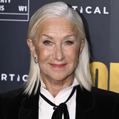 Helen Mirren with straight platinum blonde shoulder-length hair at the 
