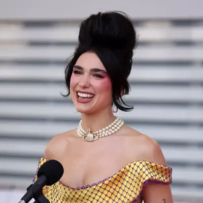 Dua Lipa with a bouffant hairstyle at the 2021 BRIT Awards.