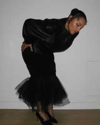 Paloma Elsesser wearing a curly updo