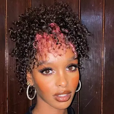 Pink peekaboo highlights on coils