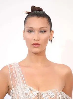 Bella Hadid in a sculpted top knot