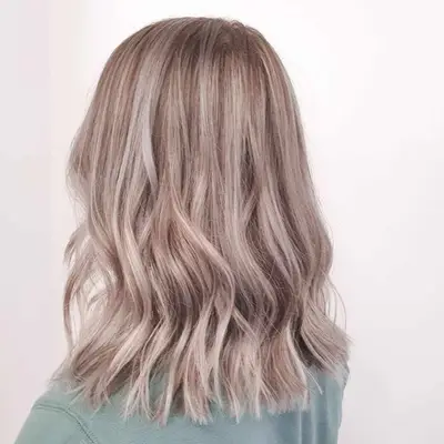 Back view of blonde hair with silver babylights
