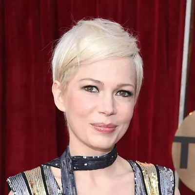Michelle Williams models a white-blonde pixie cut
