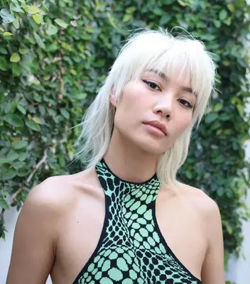 A white-blonde modern mullet