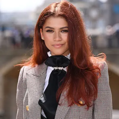 Zendaya with burgundy orange hair