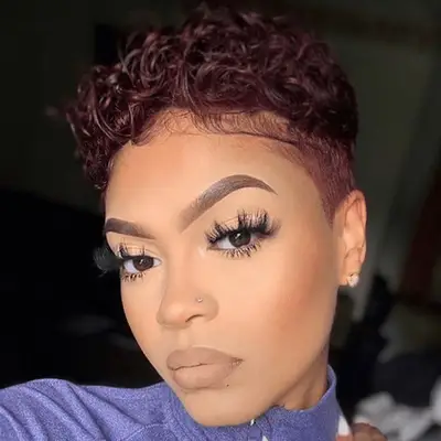 burgundy short pixie cut with curls