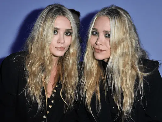 Mary-Kate and Ashley Olsen with long wavy hair