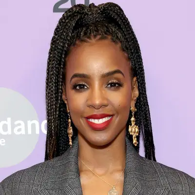 Kelly Rowland wears box braids in a high ponytail at the 2020 