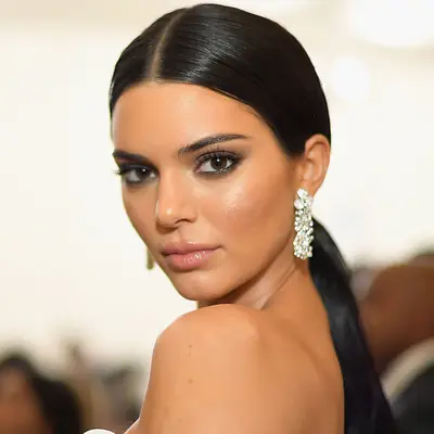 Kendall Jenner with a center-parted low ponytail at the 2018 Met Gala in New York City