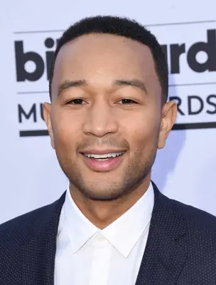 John Legend with a number 3 buzz cut on the red carpet