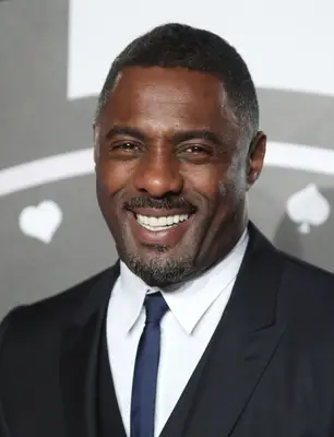 Idris Elba with a tapered fade haircut on the red carpet