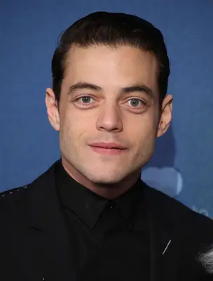 Rami Malek with a combed-back hairstyle on the red carpet