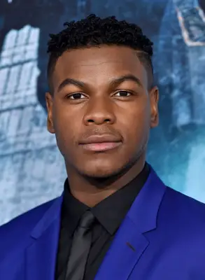 John Boyega with tapered sides and textured top hairstyle on the red carpet