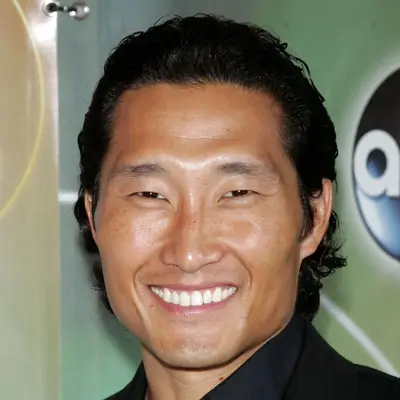 Daniel Dae Kim with raked back mid-length hair