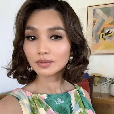 Gemma Chan with curly bob