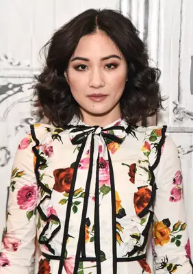 Constance Wu voluminous curly bob