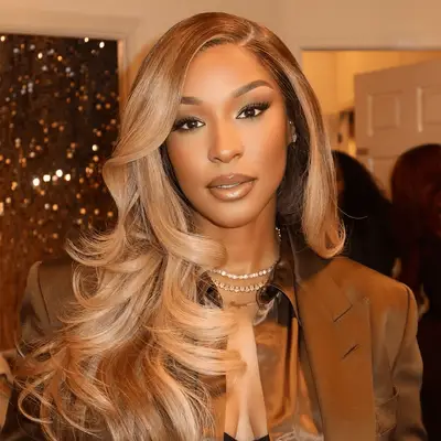 Savannah James wearing blonde curled hair