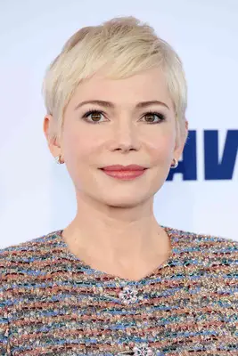 Michelle Williams with a short, blonde pixie cut