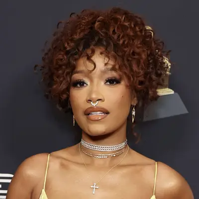 keke palmer curly updo hair