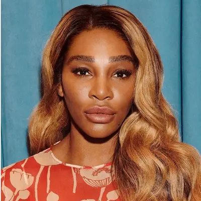 Serena Williams with long wavy dirty blonde hair